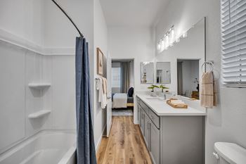 Sleek plank flooring throughout